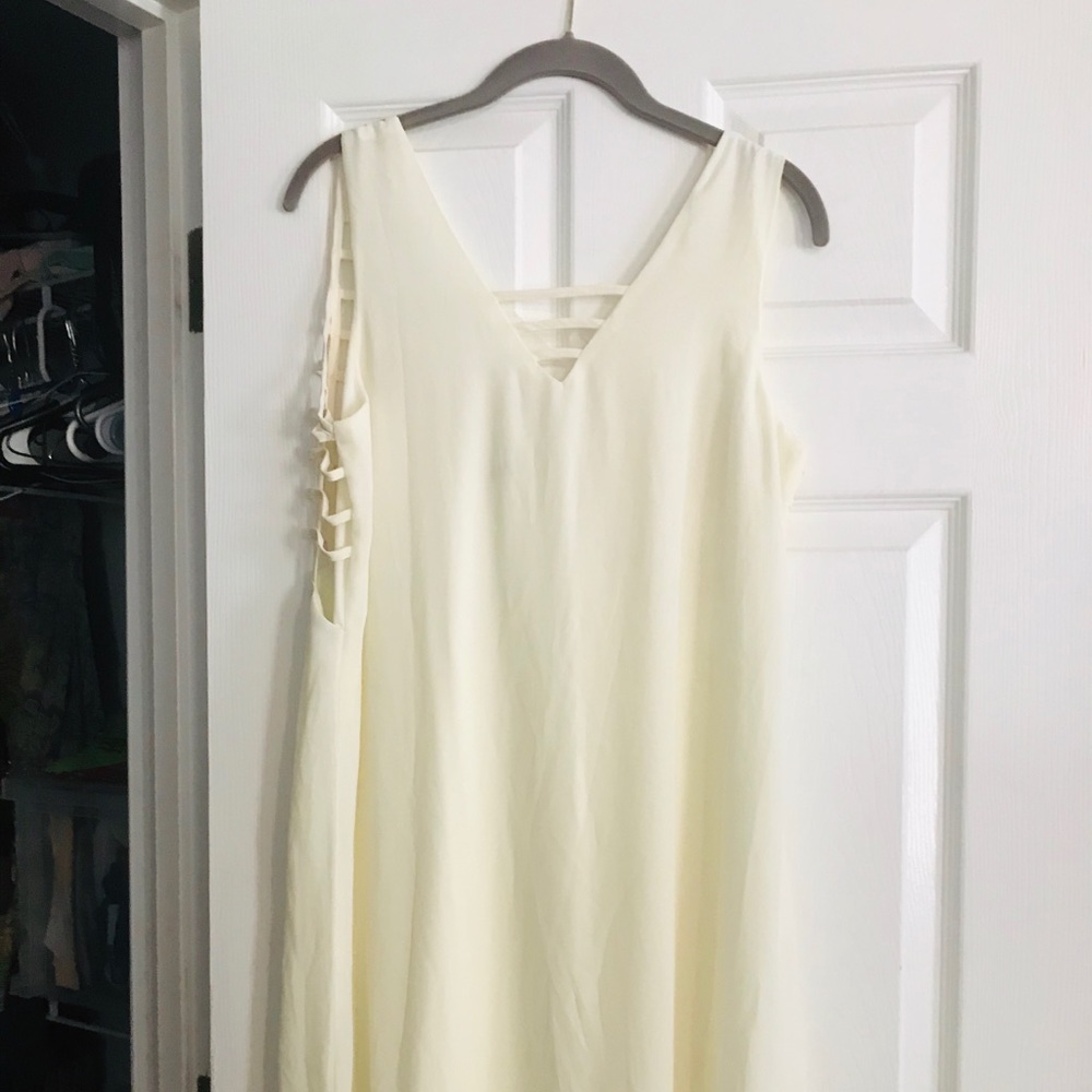 White boutique dress with cute back size large